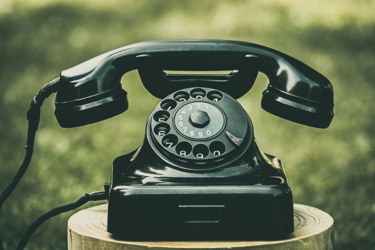 An old analog rotary telephone, the kind that ran on a copper POTS line